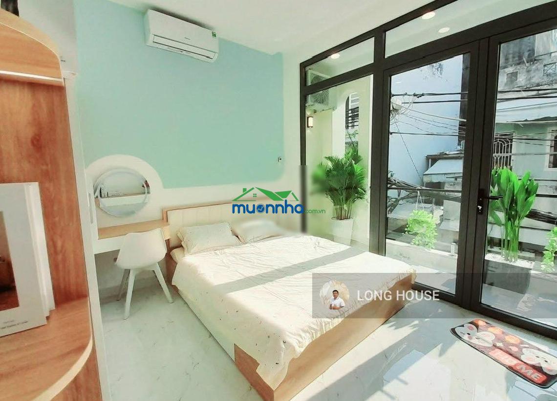 Nhà 55m2, ngang 4m, sổ nở hậu - hẻm oto thông thích quảng đức