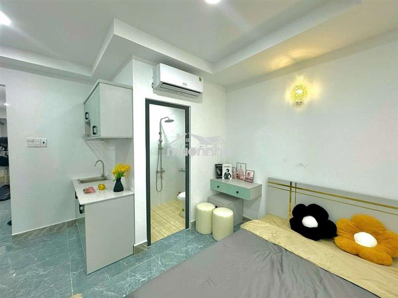 Tòa nhà 90m2 có thang máy nở hậu 4 lầu