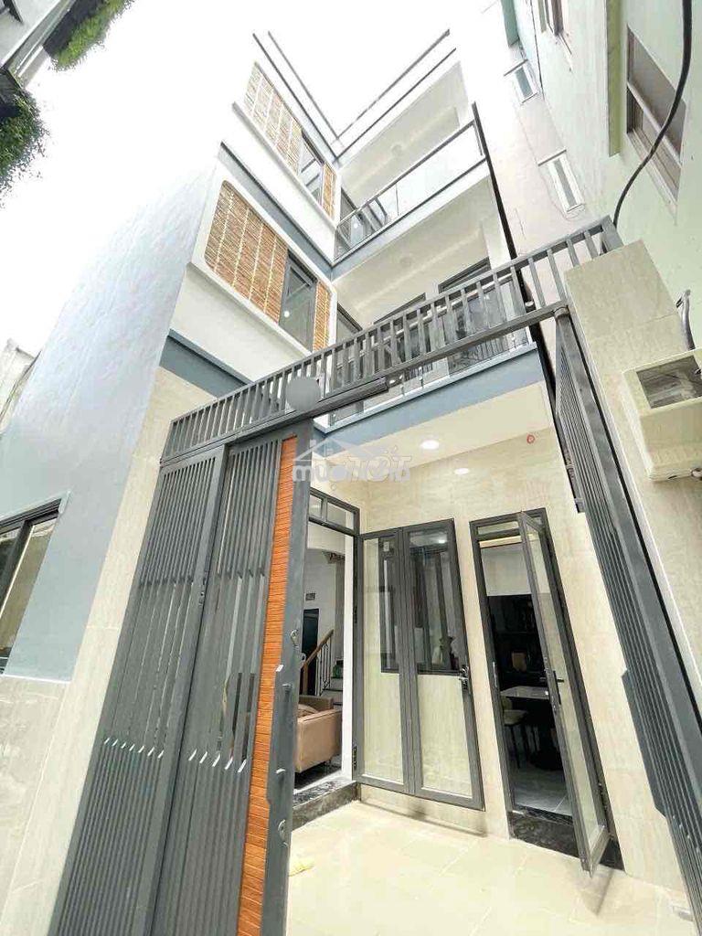 Bán nhà xây mới 4 tầng sau căn mặt tiền âu dương lân p3. q8